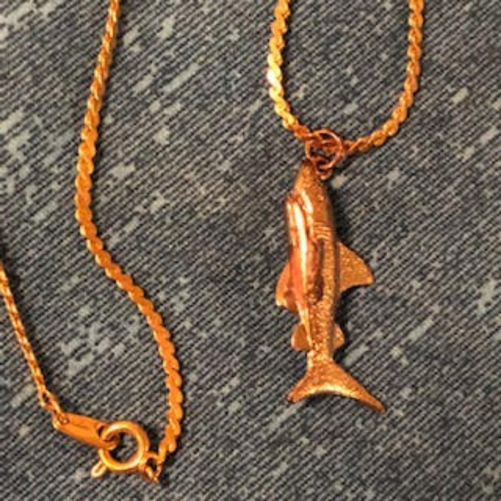 Trifari Shark Attack Gold Tone Pendant on a 22" Gold Tone Necklace